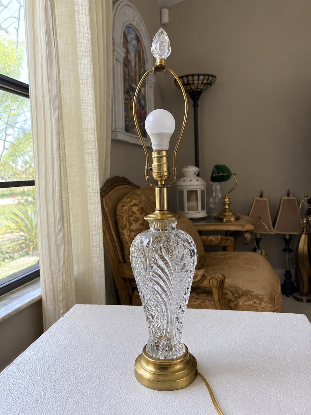 vintage cut-crystal table lamp featuring an intricate leaf-and-diamond